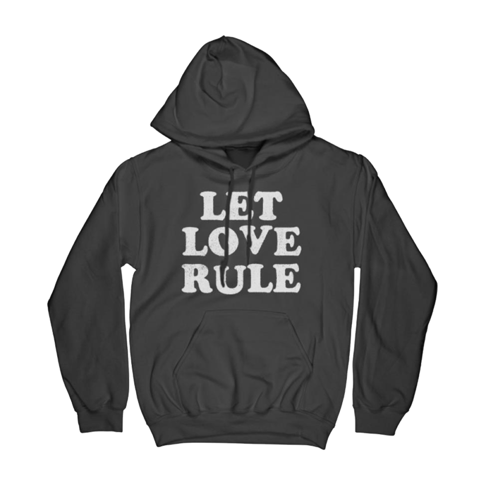 Unisex black pullover hoodie with large white “LET LOVE RULE” print on the front.